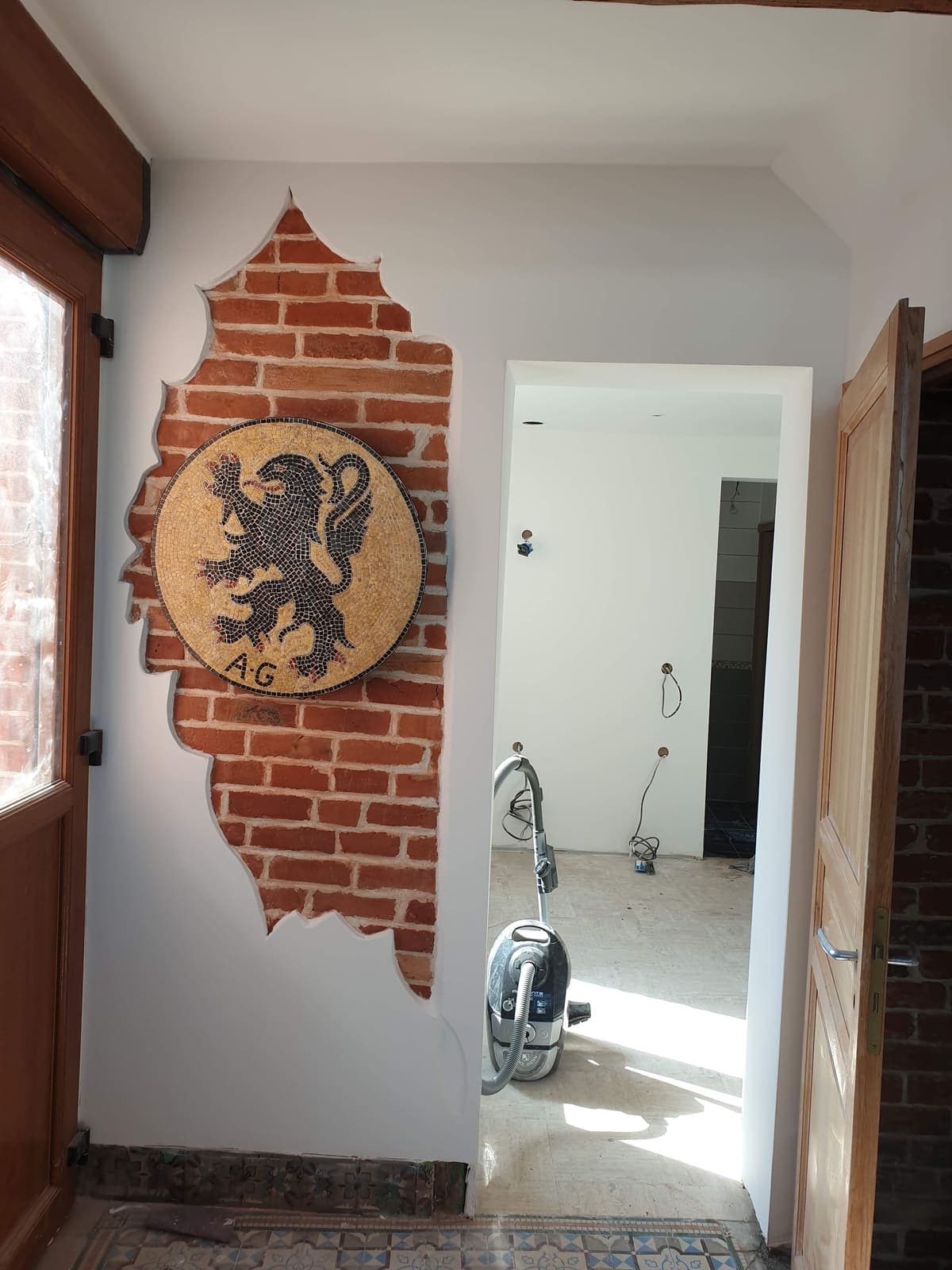 Finition terminée, brique apparente conservée (après)